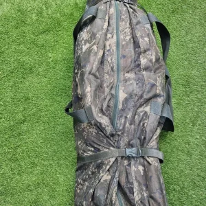 Carp fishing setup with rods, barrow, and gear - Image 6