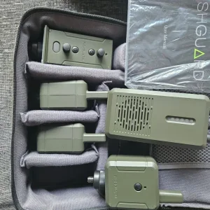 Carp fishing setup with rods, barrow, and gear - Image 8