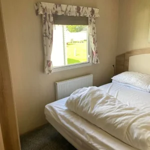 3-bedroom caravan with wrap decking and central heating - Image 8