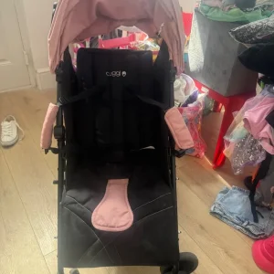 Cuggie pink pushchair