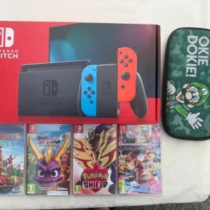 Nintendo Switch with 128GB SD card and 4 games