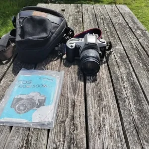 Canon Eos 500n camera with bag and user instructions