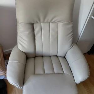 Cream swivel reclining chair