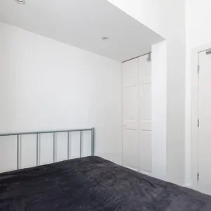 2-bedroom first-floor flat with open-plan kitchen and lounge - Image 8