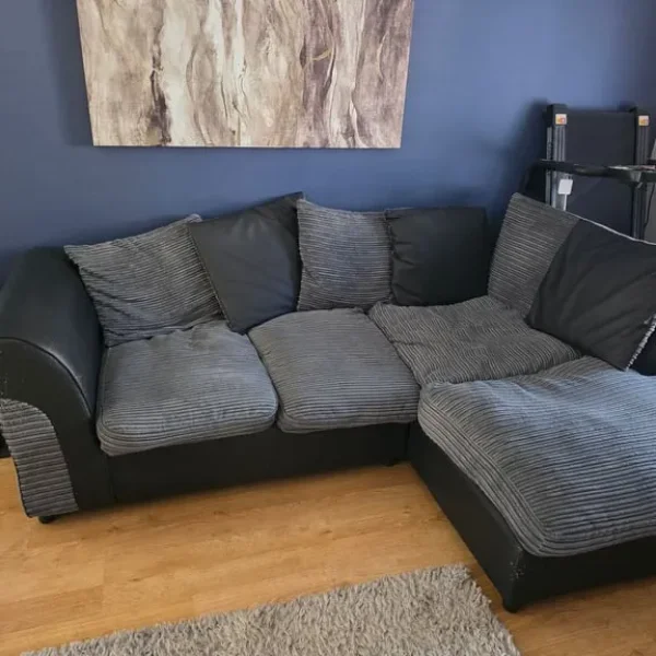 Grey and black corner sofa