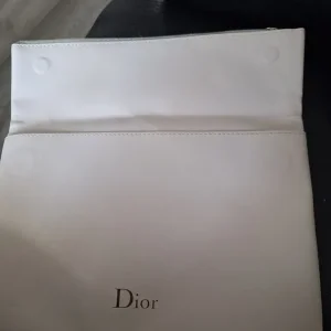Dior makeup and clutch bag - Image 2