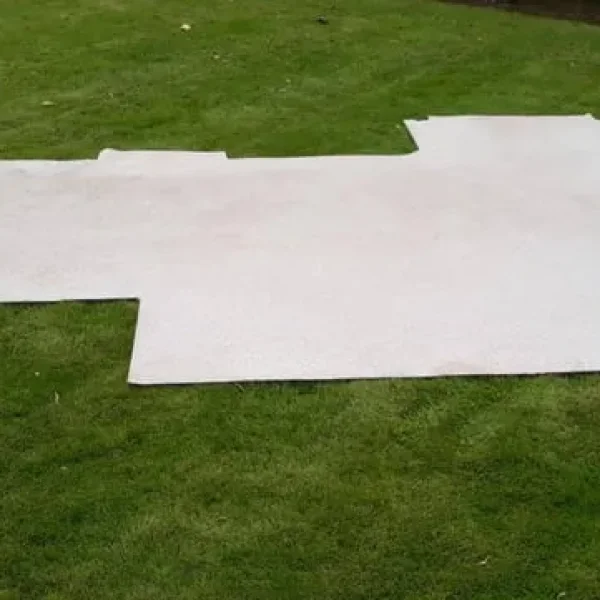 2 pieces of slip-resistant felt-backed vinyl in neutral stone pattern