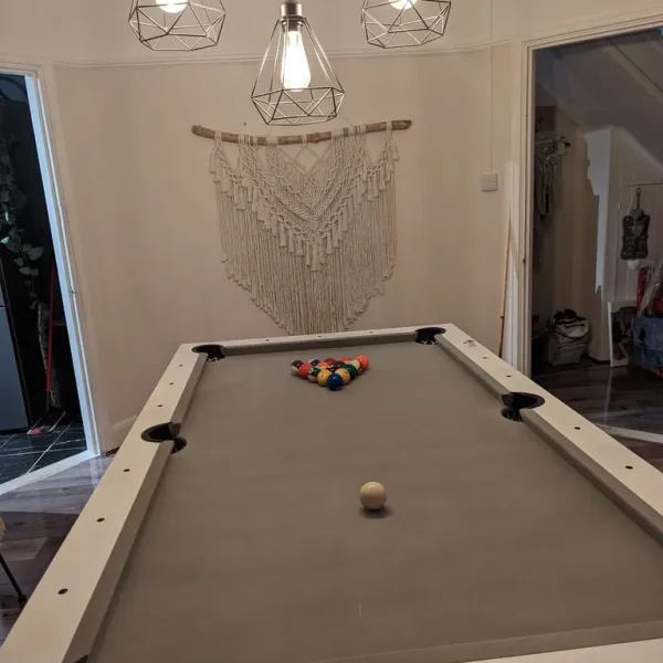 Pool table that doubles as dining and table tennis