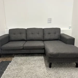 Grey L shape sofa with reversible chaise