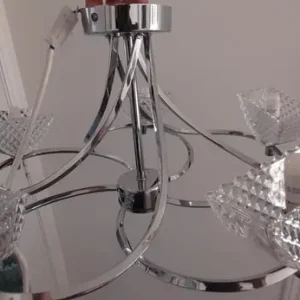 Two modern ceiling lights with chrome glass shades
