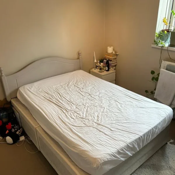 Double bed frame and small double mattress