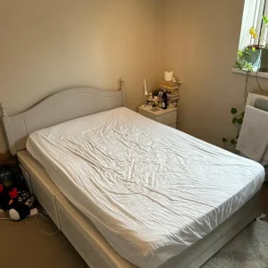 Double bed frame and small double mattress