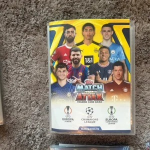 Topps Match Attax 21/22 and 22/23 books with Premier League Panini and extra card piles - Image 4