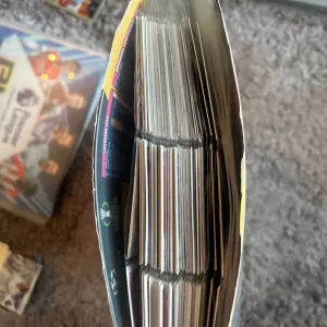 Topps Match Attax 21/22 and 22/23 books with Premier League Panini and extra card piles - Image 5