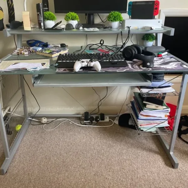 Desk with three work surfaces