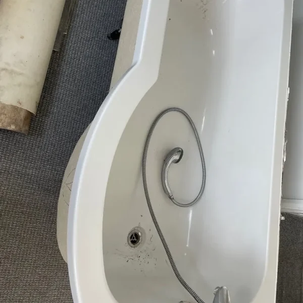 P shaped bath with glass curved shower screen