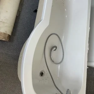 P shaped bath with glass curved shower screen