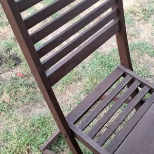Wooden garden table with 4 chairs and parasol with new cushions - Image 7