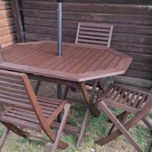 Wooden garden table with 4 chairs and parasol with new cushions - Image 8