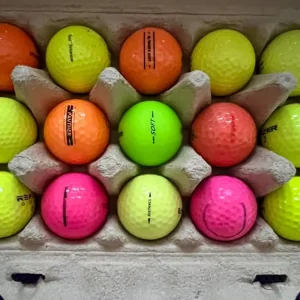 15 coloured used golf balls