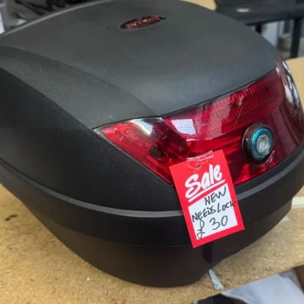Scooter rear top box with helmet