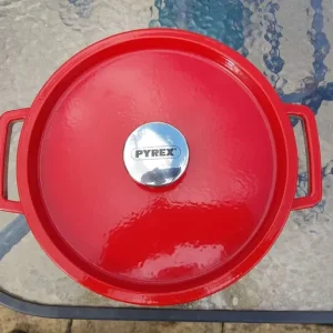 red pyrex enamelled cast iron creuset casserole dish