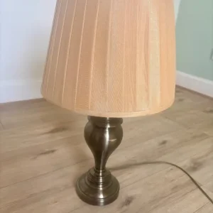 Four lamps, one tall, three table top