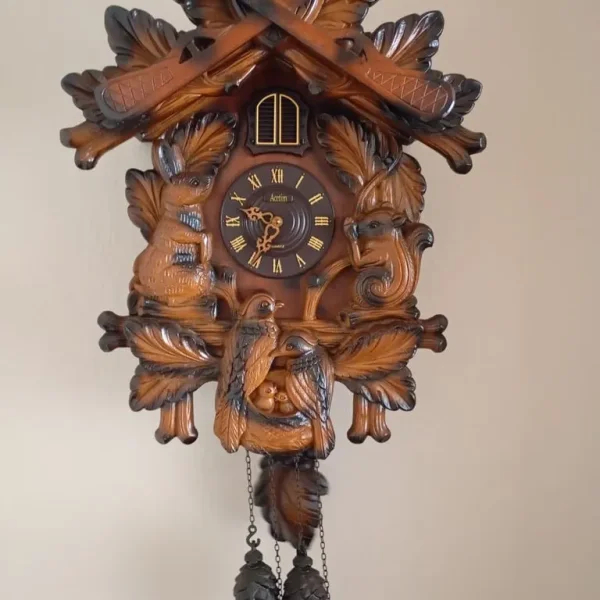 Wooden effect cuckoo clock