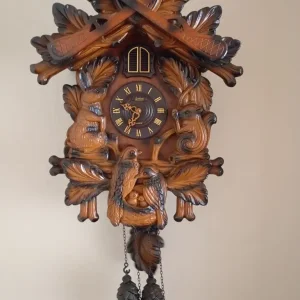 Wooden effect cuckoo clock
