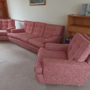 Three piece suite and footstool in excellent condition