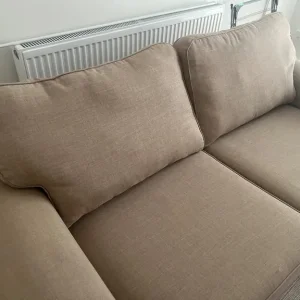 Comfy beige three-seater sofa - Image 2