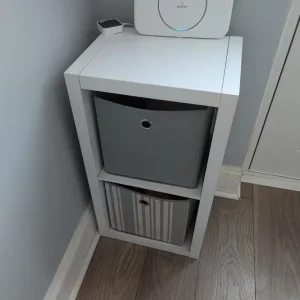 White storage cube with 2 grey boxes