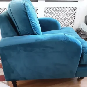 Teal velvet armchair with castors - Image 2