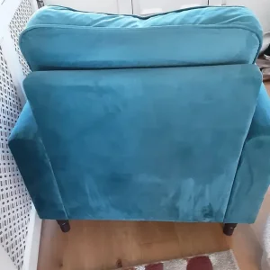 Teal velvet armchair with castors - Image 3