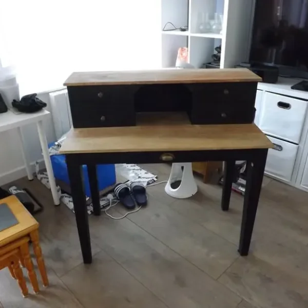 Black wooden desk with drawers