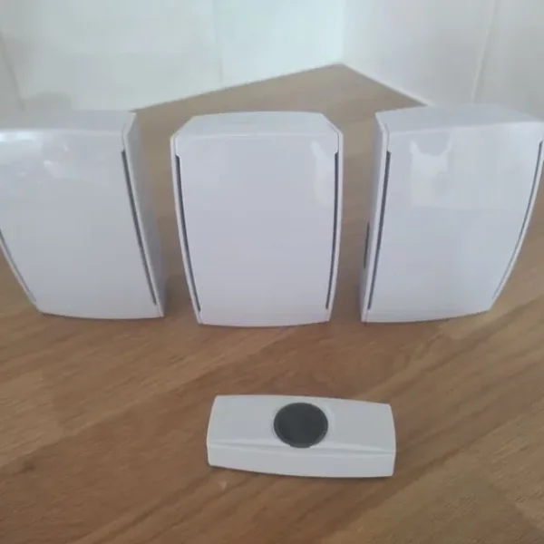 Byron plug in wireless door chimes and push