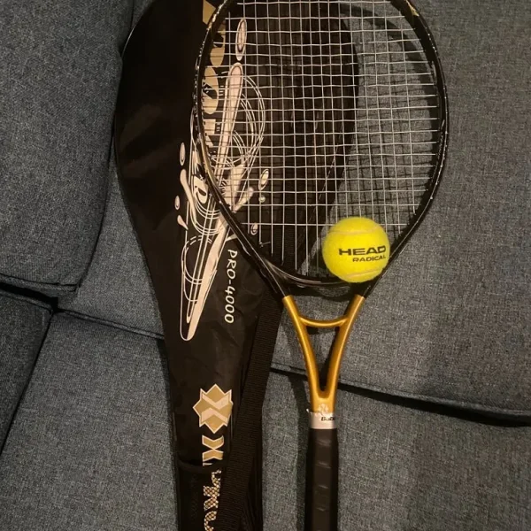 Xpro tennis racquet with cover and ball