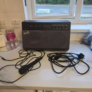 Microphone, speaker, and stand