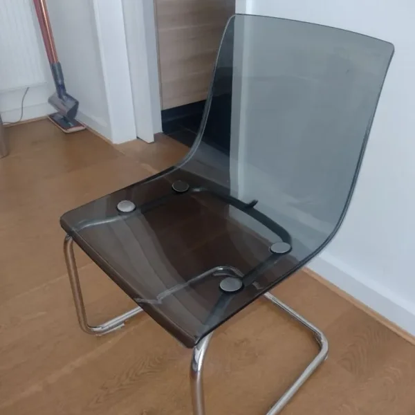 Extendable black dining table with 4 chairs