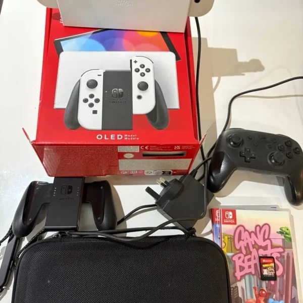 Nintendo Switch OLED 128GB with Pro Controller and 3 Games