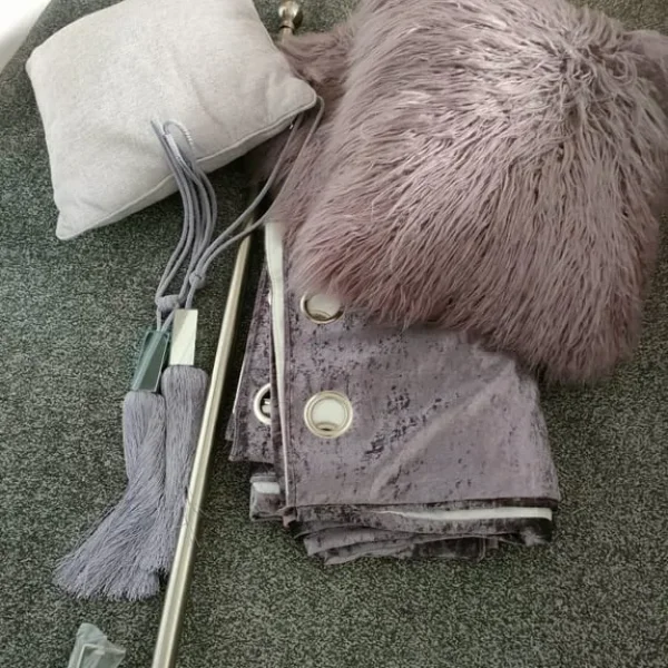 Curtains and curtain pole with cushions and tie backs