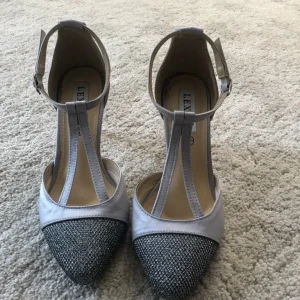Matching silver satin shoes and clutch - Image 2