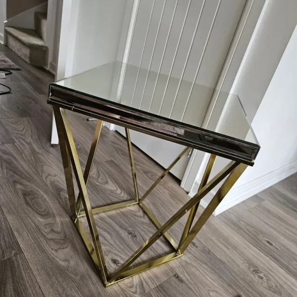 Mirrored brass side table