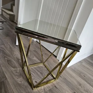 Mirrored brass side table
