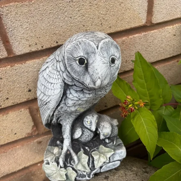 Stone owl garden ornament
