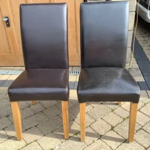 2 Brown faux leather dining chairs
