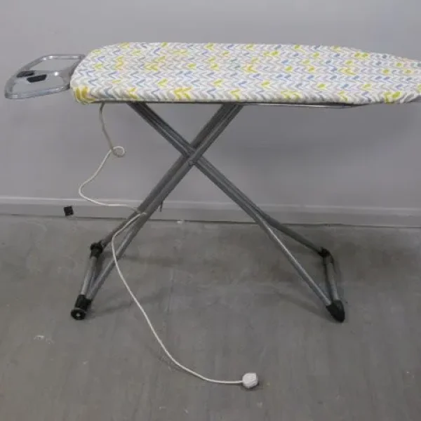 Ironing Board with extention cable and socket . On wheels