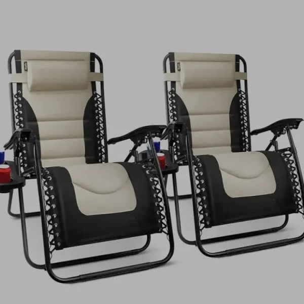 A pair of nice cream padded garden sunloungers