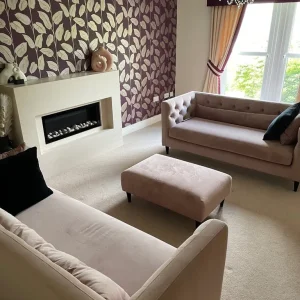 2 x 3 seater peach sofa and footstool for sale
