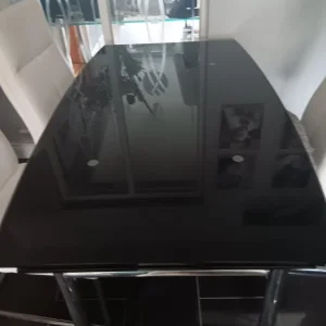 Extendable black glass dining table